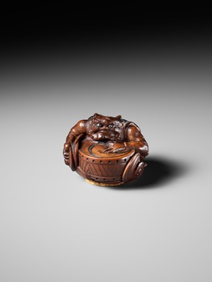 Lot 317 - OSAI: A WOOD OKIMONO OF RAIJIN DISCHARGING A STORM