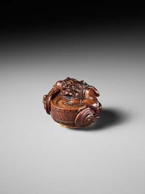 Lot 317 - OSAI: A WOOD OKIMONO OF RAIJIN DISCHARGING A STORM