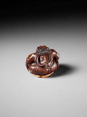 Lot 317 - OSAI: A WOOD OKIMONO OF RAIJIN DISCHARGING A STORM