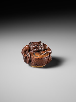 Lot 317 - OSAI: A WOOD OKIMONO OF RAIJIN DISCHARGING A STORM