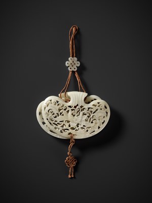 Lot 172 - A WHITE JADE RETICULATED POUCH-FORM POMANDER, QING DYNASTY