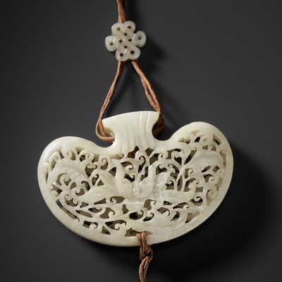 Lot 172 - A WHITE JADE RETICULATED POUCH-FORM POMANDER, QING DYNASTY