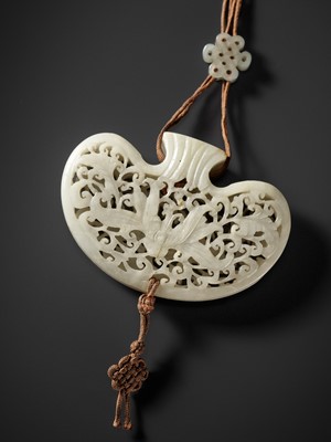 Lot 172 - A WHITE JADE RETICULATED POUCH-FORM POMANDER, QING DYNASTY