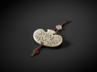 Lot 172 - A WHITE JADE RETICULATED POUCH-FORM POMANDER, QING DYNASTY