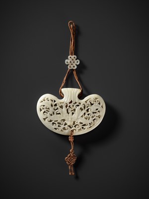 Lot 172 - A WHITE JADE RETICULATED POUCH-FORM POMANDER, QING DYNASTY