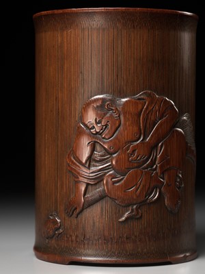 Lot 373 - A BAMBOO BRUSHPOT DEPICTING LIU HAI AND HIS TOAD, BITONG, BY WU ZHIFAN, JIADING SCHOOL, EARLY QING DYNASTY