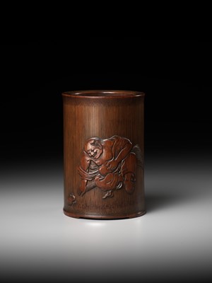 Lot 373 - A BAMBOO BRUSHPOT DEPICTING LIU HAI AND HIS TOAD, BITONG, BY WU ZHIFAN, JIADING SCHOOL, EARLY QING DYNASTY