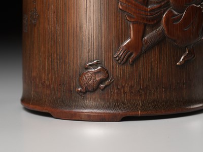 Lot 373 - A BAMBOO BRUSHPOT DEPICTING LIU HAI AND HIS TOAD, BITONG, BY WU ZHIFAN, JIADING SCHOOL, EARLY QING DYNASTY