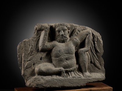 Lot 330 - A GRAY SCHIST FIGURE OF ATLAS, ANCIENT REGION OF GANDHARA, 2ND-3RD CENTURY