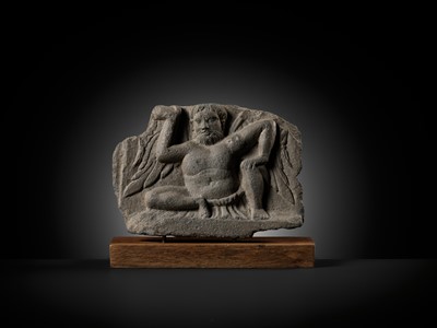 Lot 330 - A GRAY SCHIST FIGURE OF ATLAS, ANCIENT REGION OF GANDHARA, 2ND-3RD CENTURY