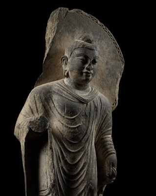 A PUBLISHED GRAY SCHIST FIGURE OF BUDDHA SHAKYAMUNI, ANCIENT REGION OF GANDHARA, 3RD-4TH CENTURY