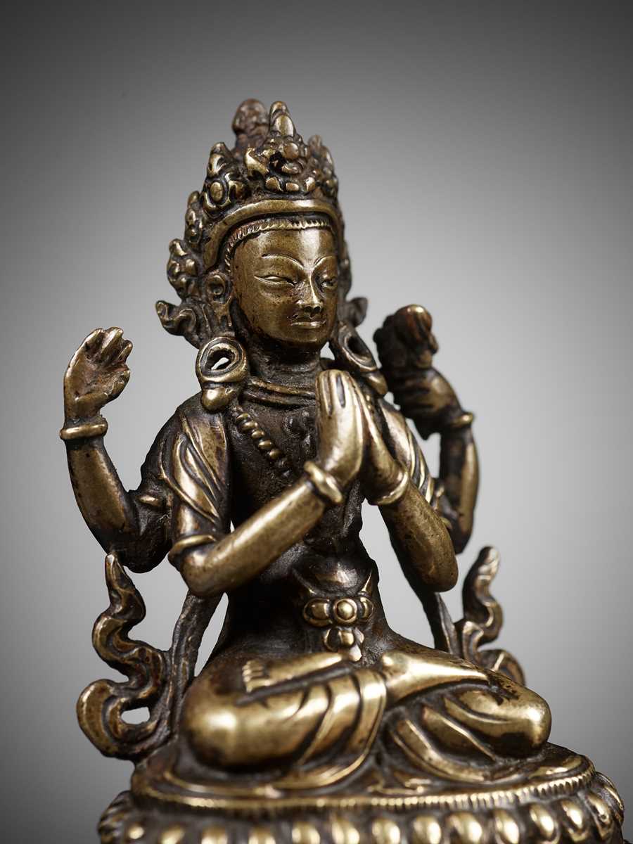 Lot 16 - A COPPER ALLOY FIGURE OF SHADAKSHARI