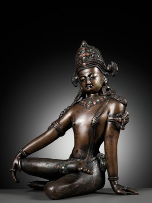 Lot 24 - A CORAL AND TURQUOISE-INLAID BRONZE FIGURE OF INDRA, NEPAL, 19TH CENTURY