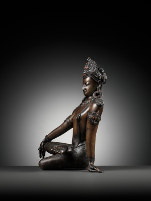 Lot 24 - A CORAL AND TURQUOISE-INLAID BRONZE FIGURE OF INDRA, NEPAL, 19TH CENTURY