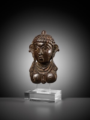 Lot 258 - A BRONZE PROCESSIONAL MASK, MOHRA, DEPICTING LAKSHMI, 17TH-18TH CENTURY