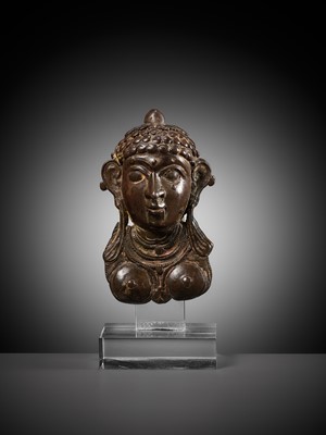 Lot 258 - A BRONZE PROCESSIONAL MASK, MOHRA, DEPICTING LAKSHMI, 17TH-18TH CENTURY