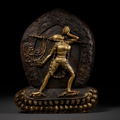 Lot 285 - A GILT COPPER REPOUSSÉ PLAQUE OF VAJRAYOGINI, TIBET, 18TH-19TH CENTURY