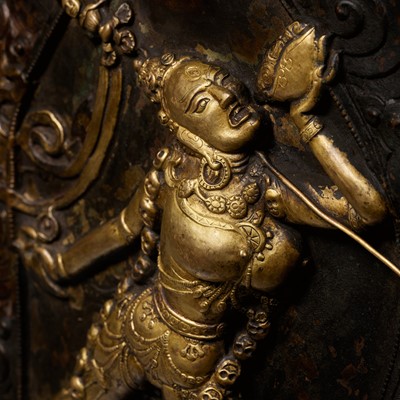 Lot 285 - A GILT COPPER REPOUSSÉ PLAQUE OF VAJRAYOGINI, TIBET, 18TH-19TH CENTURY