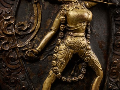 Lot 285 - A GILT COPPER REPOUSSÉ PLAQUE OF VAJRAYOGINI, TIBET, 18TH-19TH CENTURY