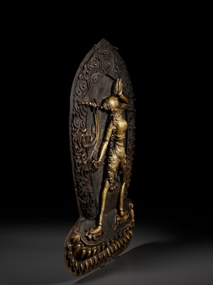 Lot 285 - A GILT COPPER REPOUSSÉ PLAQUE OF VAJRAYOGINI, TIBET, 18TH-19TH CENTURY