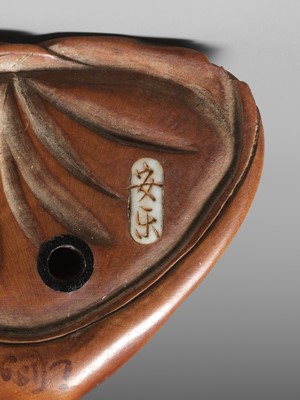 Lot 59 - ANRAKU: A FINE AND HUMOROUS WOOD NETSUKE OF TANUKI DISGUISED AS A PRIEST