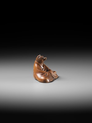 Lot 59 - ANRAKU: A FINE AND HUMOROUS WOOD NETSUKE OF TANUKI DISGUISED AS A PRIEST