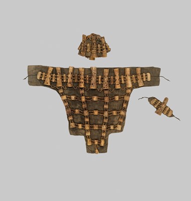 Lot 287 - A NECROMANCER’S BONE HEADDRESS, WRISTBAND AND APRON, TIBET OR NEPAL, 18TH-19TH CENTURY