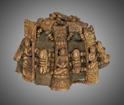 Lot 287 - A NECROMANCER’S BONE HEADDRESS, WRISTBAND AND APRON, TIBET OR NEPAL, 18TH-19TH CENTURY