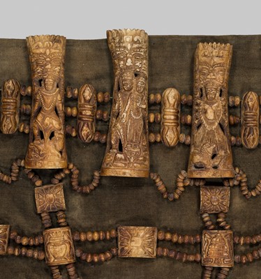 Lot 287 - A NECROMANCER’S BONE HEADDRESS, WRISTBAND AND APRON, TIBET OR NEPAL, 18TH-19TH CENTURY