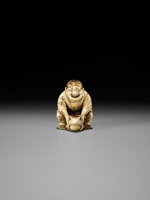 Lot 71 - MASATSUGU: AN AMUSING OSAKA SCHOOL IVORY NETSUKE OF GAMA SENNIN LIFTING HIS TOAD