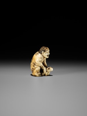 Lot 71 - MASATSUGU: AN AMUSING OSAKA SCHOOL IVORY NETSUKE OF GAMA SENNIN LIFTING HIS TOAD