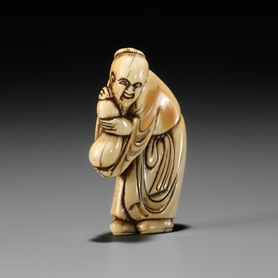 Lot 2 - AN EARLY IVORY NETSUKE OF A CHINESE IMMORTAL WITH A GOURD