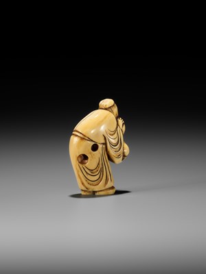 Lot 2 - AN EARLY IVORY NETSUKE OF A CHINESE IMMORTAL WITH A GOURD