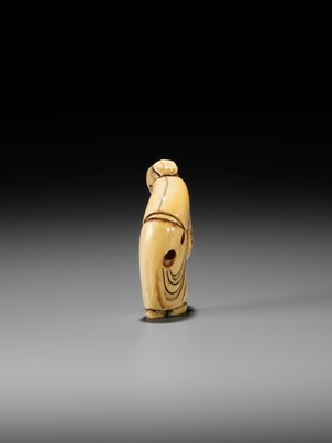 Lot 2 - AN EARLY IVORY NETSUKE OF A CHINESE IMMORTAL WITH A GOURD