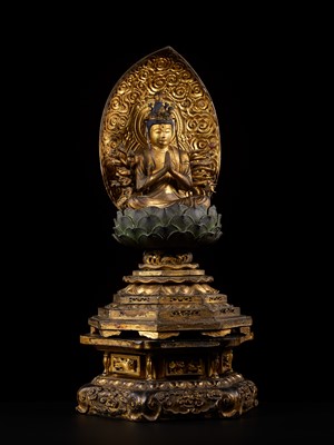 Lot 13 - A GILT-LACQUERED WOOD FIGURE OF THOUSAND-ARMED KANNON, EDO PERIOD