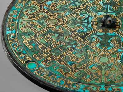 Lot 65 - A SUPERB TURQUOISE AND GOLD-INLAID BRONZE MIRROR, EASTERN ZHOU DYNASTY, WARRING STATES PERIOD
