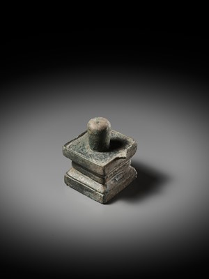 Lot 596 - A BRONZE LINGA AND YONI, ANGKOR PERIOD