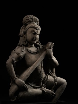 Lot 242 - AN IMPORTANT BUFF SANDSTONE FIGURE OF SHIVA VINADHARA, LATER GUPTA
