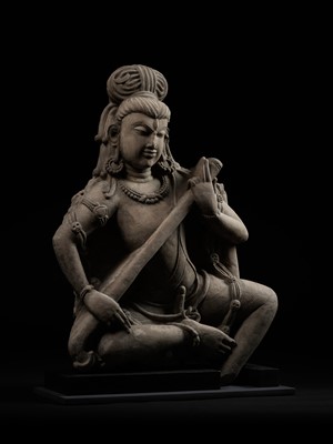 Lot 242 - AN IMPORTANT BUFF SANDSTONE FIGURE OF SHIVA VINADHARA, LATER GUPTA