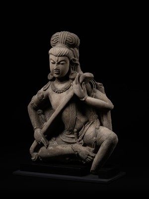 Lot 242 - AN IMPORTANT BUFF SANDSTONE FIGURE OF SHIVA VINADHARA, LATER GUPTA