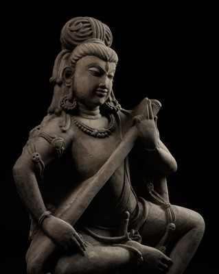 Lot 242 - AN IMPORTANT BUFF SANDSTONE FIGURE OF SHIVA VINADHARA, LATER GUPTA