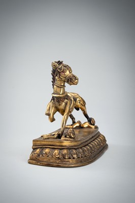 Lot 1457 - A GILT BRONZE FIGURE OF PALDEN LHAMO´S MULE, 17th – 18th CENTURY