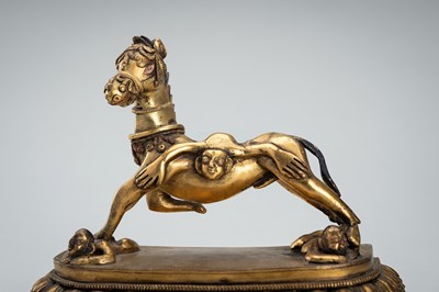 Lot 1457 - A GILT BRONZE FIGURE OF PALDEN LHAMO´S MULE, 17th – 18th CENTURY