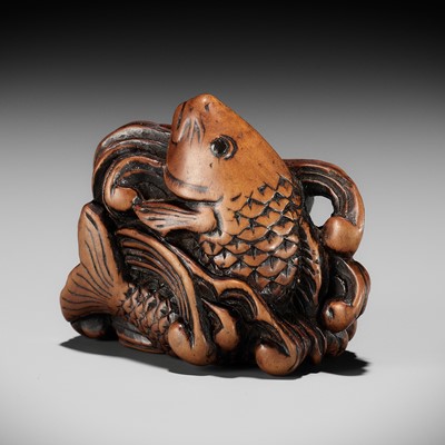 Lot 119 - A SUPERB WOOD NETSUKE OF A LEAPING CARP AMONGST TURBULENT WAVES