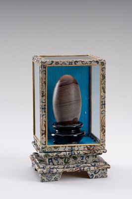 Lot 1222 - A MINIATURE STONE LINGAM, 19TH CENTURY OR EARLIER