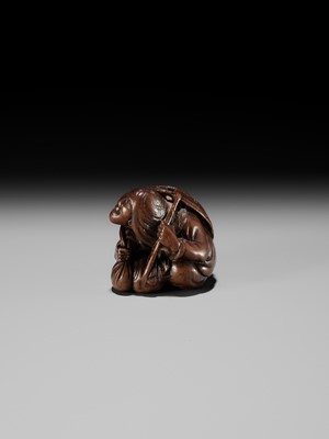 Lot 116 - MASAHIRO: A WOOD NETSUKE OF SOTOBA KOMACHI
