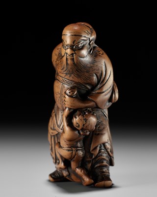 Lot 148 - A FINE EARLY EDO SCHOOL WOOD NETSUKE OF SHOKI AND ONI