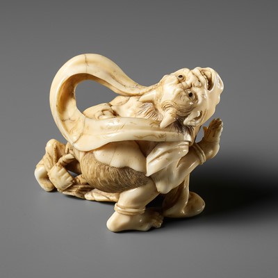 Lot 375 - AN AMUSING MARINE IVORY OKIMONO OF AN ONI AND A CRAB