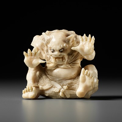 Lot 376 - AN AMUSING IVORY OKIMONO OF AN ONI AND WASP