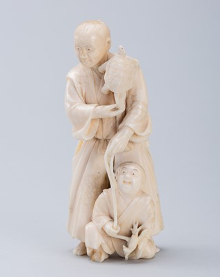 Lot 722 - AN IVORY OKIMONO OF A FISHERMAN AND BOY